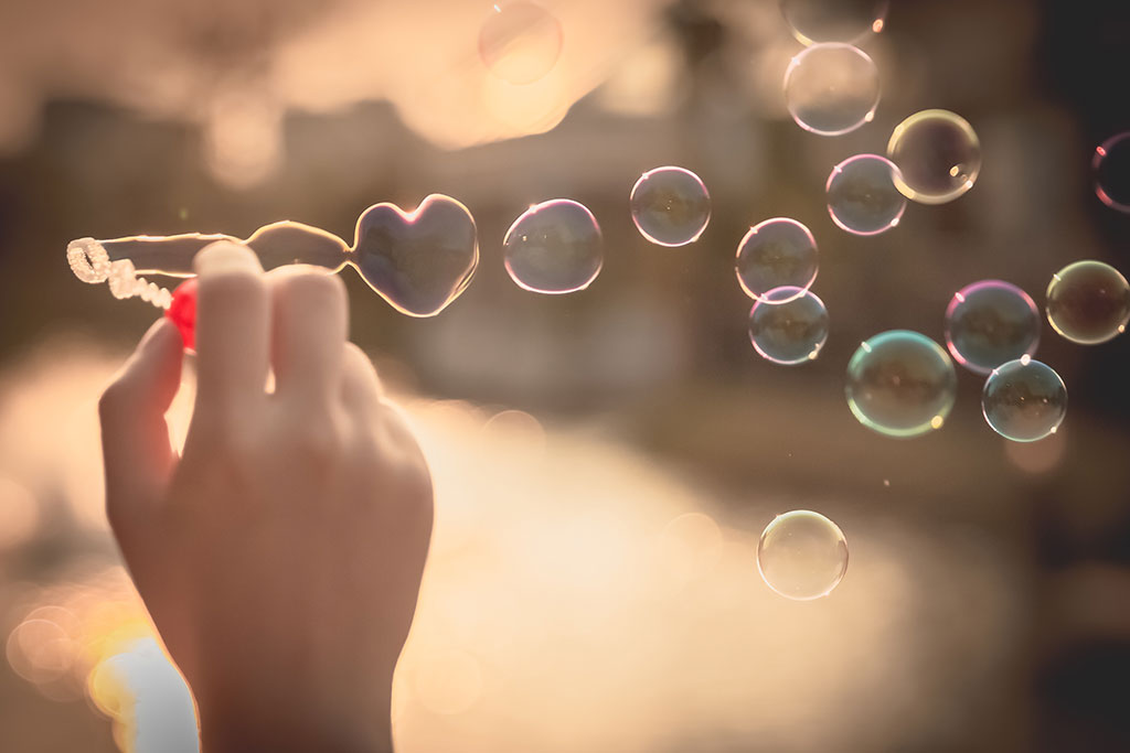 Blowing heart bubbles for Love Quotes post