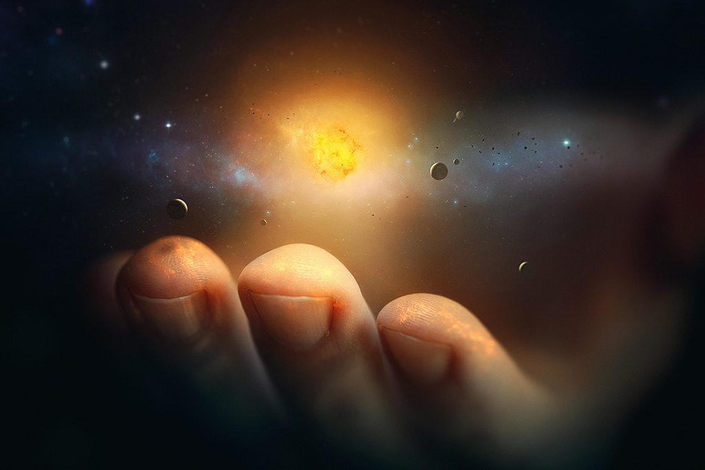 hand holding the universe