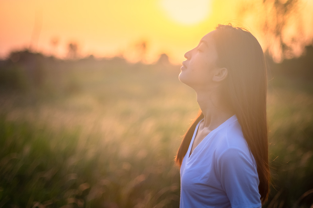 Woman out in nature with the Peace that Transcends Understanding