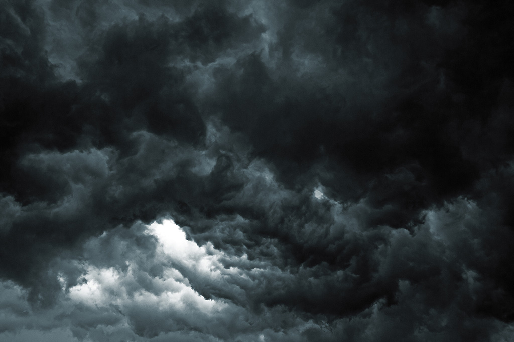 Dark brooding clouds in a storm darkened sky